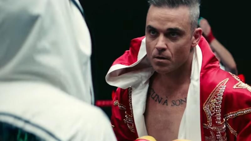 Робби Уильямс в новом клипе дерется и танцует: видео Робби Уильямс в новом клипе дерется и танцует: видео