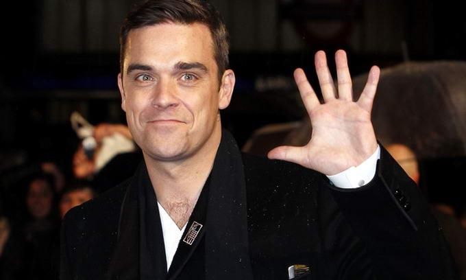 Роббі Вільямс рекламує новий альбом власними оголеними сідницями: фото Роббі Вільямс рекламує новий альбом власними оголеними сідницями: фото