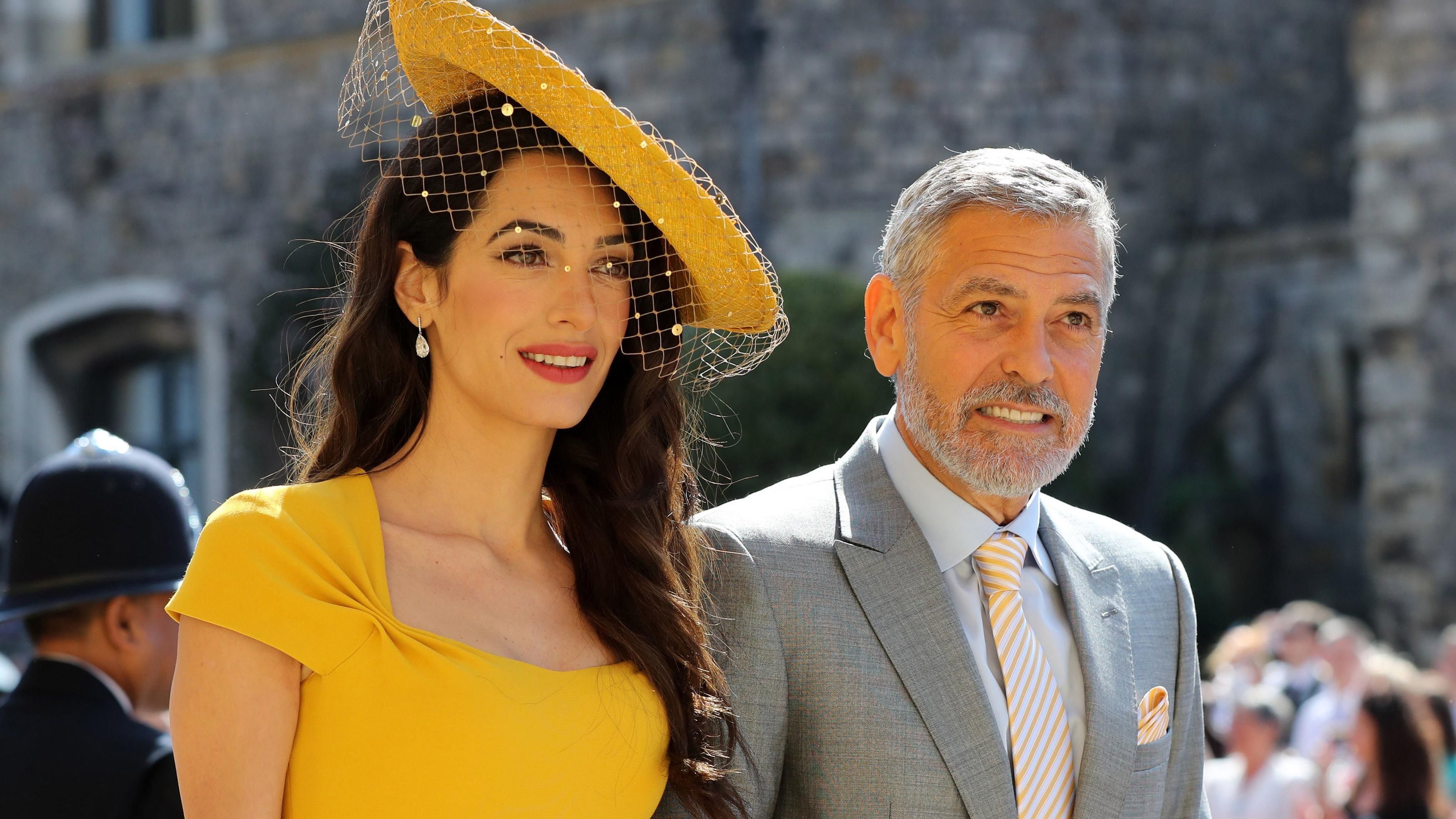 Первые гости королевской свадьбы: несравненная Амаль и Джордж Клуни – фото