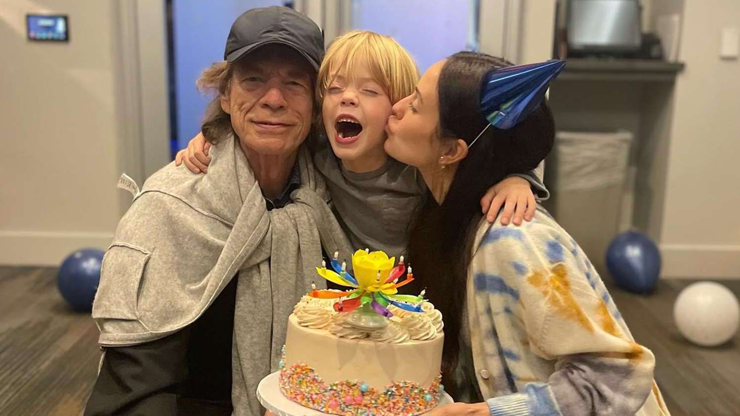 Мік Джаггер з коханою і сином Мік Джаггер з коханою і сином